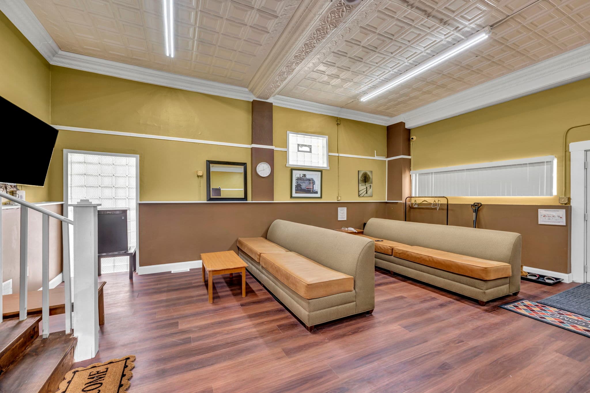 Warm, sunlit shared living space with comfortable seating